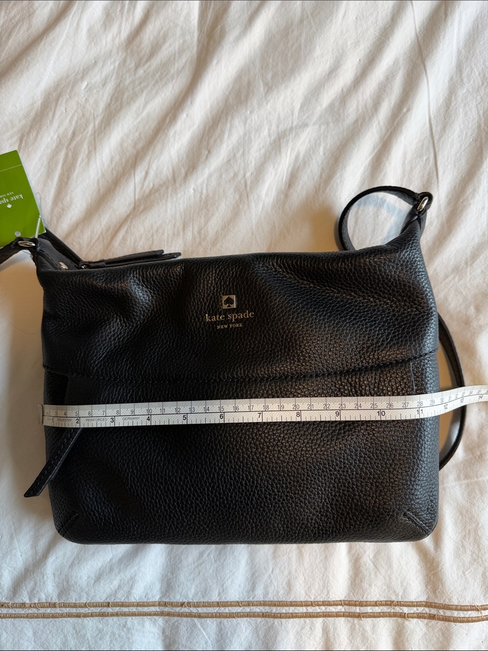 Kate Spade Starla black pebbled leather crossbody with gold logo